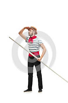 Caucasian man in traditional gondolier costume and hat