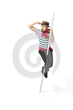 Caucasian man in traditional gondolier costume and hat