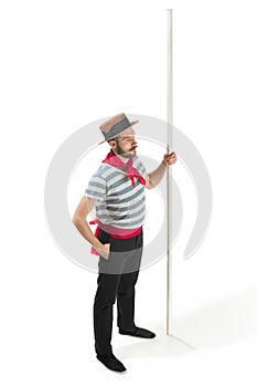 Caucasian man in traditional gondolier costume and hat