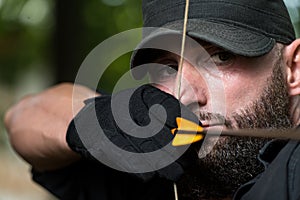 Caucasian Man Training With The Bow