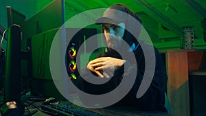 Caucasian man typing keyboard computer desktop pc online cyber crime virtual networks browser programmer coding monitor