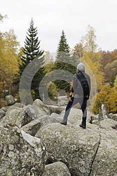 Caucasian man walking in a mountain.