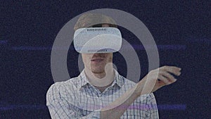Caucasian man wearing vr headset against copy space on black background