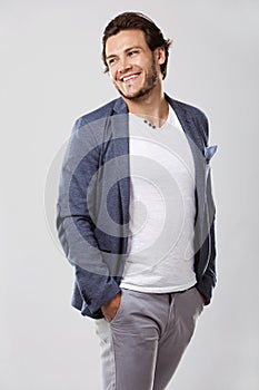 Caucasian man wearing white shirt and trendy hairstyle