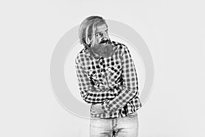Caucasian mature hipster with trendy hairstyle in checkered shirt having stomach ache, treatment