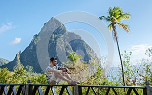 Caucasian men view at the Pitons of St Lucia Saint Lucia, Caribbean, nature trail in the jungle