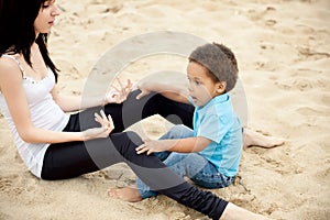 Multi-Ethnic family relaxing together outdoors