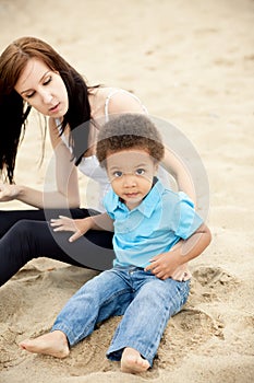 Multi-Ethnic family relaxing together outdoors