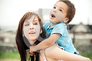 Multi-Ethnic family relaxing together outdoors