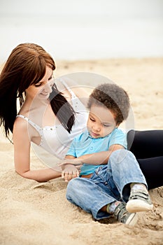 Multi-Ethnic family relaxing together outdoors