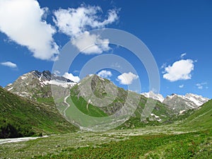 Caucasian mountains in Georgia grass and rocks landscape