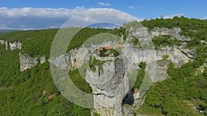 Caucasian mountains, Katskhi Pillar standing alone with Orthodox church on top