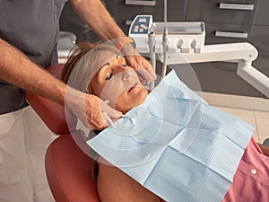 Caucasian Patient Prepares for Dentist Checkup
