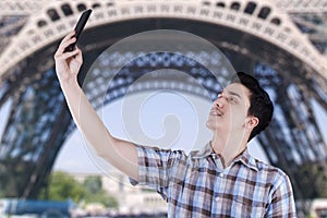 Caucasian person take selfie photo in Paris