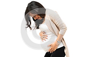 Caucasian pregnant woman having strong contractions