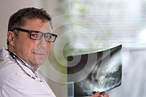 Doctor reading X-ray images