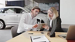 Caucasian rich man customer buyer client in suit sign contract on tablet.