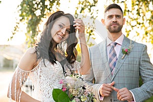 Caucasian romantic young couple celebrating their marriage in city