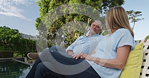 Caucasian senior couple enjoying their time together in a garden