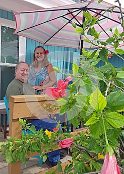 Caucasian Senior Couple Sitting on Porch