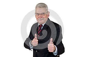 A caucasian senior manager posing with thumbs up