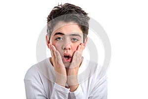 Caucasian smooth-skinned boy placing hands on face
