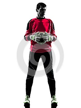 Caucasian soccer player goalkeeper man holding ball silhouette