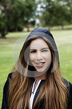 Caucasian Teen Girl Outdoor Portrait In Black Hoodie Jacket