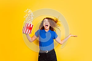 Caucasian teen`s girl portrait on yellow background