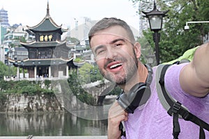 Caucasian tourist in Guyiang, China photo