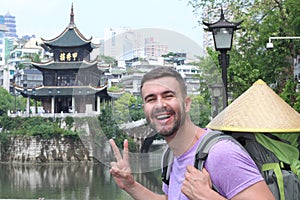Caucasian tourist in Guyiang, China photo