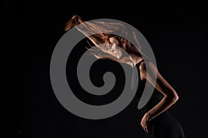 Caucasian white female model portrait. The wind blowing the long blonde hair off on beautiful girl.