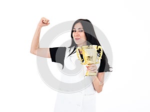 Caucasian winner girl proud while raise golden trophy victory prize after playoff challenge and show strong arm isolated on white