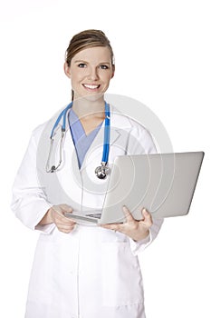 Caucasian woman doctor or nurse holding a laptop computer