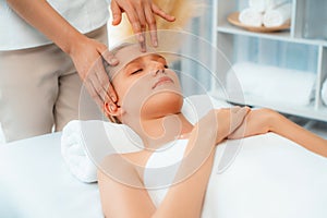 Caucasian woman enjoying relaxing anti-stress head massage. Quiescent