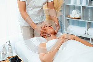 Caucasian woman enjoying relaxing anti-stress head massage. Quiescent