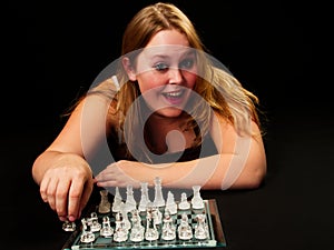 Caucasian Woman On the Floor With Chess Board