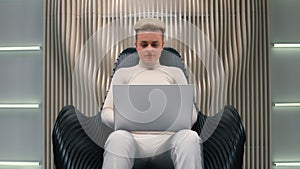 Caucasian woman girl in white neon futuristic space female IT programmer hacker coder gamer hacker software computer