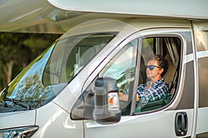 Caucasian Woman in Her 60s Driving RV Camper Van