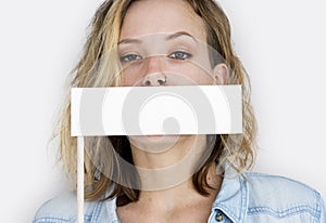 Caucasian Woman Holding Flag Covering Mouth