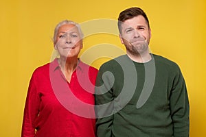 Caucasian woman and man pursing lips saving secret