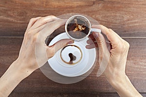 A caucasian woman is performing fortune reading  kahve fali  using leftover coffee grounds photo