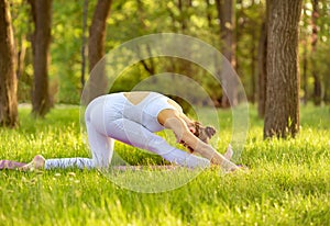 Caucasian woman practicing yoga. Young woman enjoying meditation.