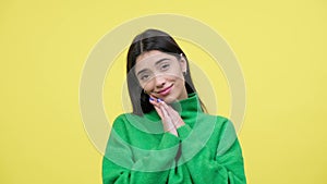 Caucasian Woman Reacts Cutely On Yellow Background
