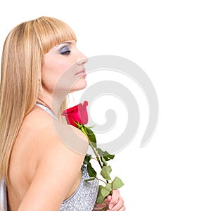 Caucasian woman with red rose