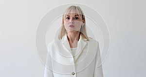 Caucasian Woman Shaking Head in Disagreement on White Background