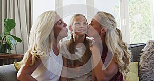 Caucasian woman spending time with her mother and her daughter