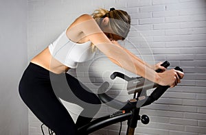 Caucasian Woman on Stationary Bike