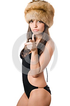 Caucasian woman in swimsuit and fur-cap