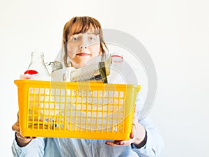 Caucasian woman with trash ready for recycling